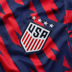 Youth Nike USWNT 2023 VW Pre-Match Red Top - Front Crest View