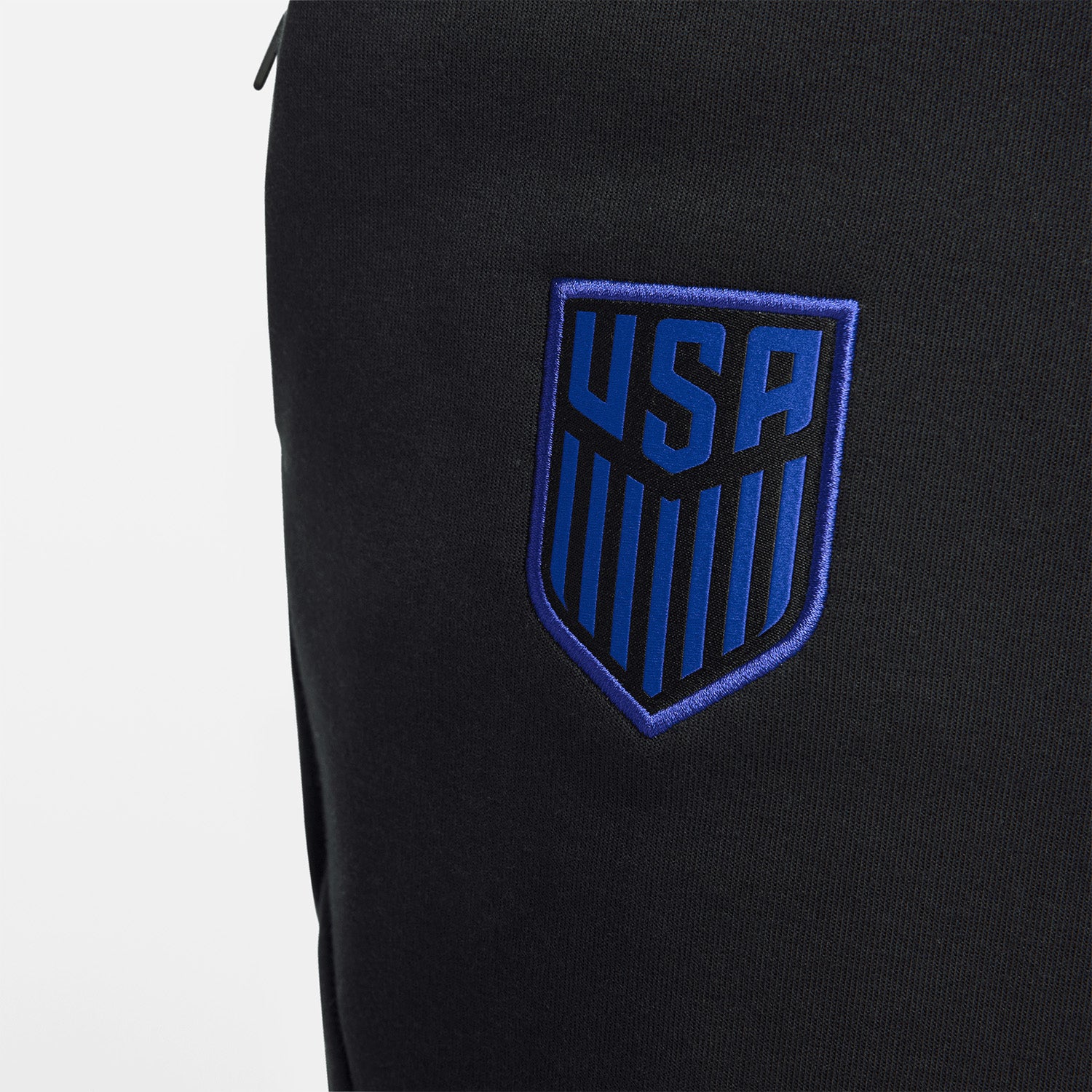 Men's Nike USA Tech Fleece Black Jogger Pants - Logo View