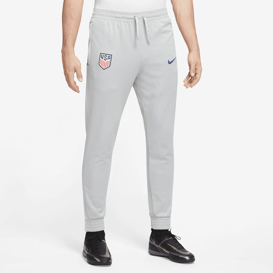 Men's Nike USA Fleece Travel Pants in Grey - Front View